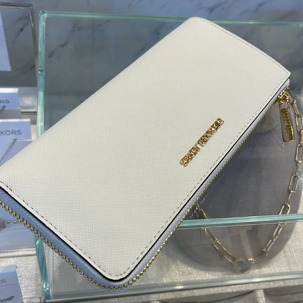 MICHAEL KORS Jet Set Travel Lg Saffiano Leather Quarter-Zip Wallet
Optic White - Picture 10 of 16